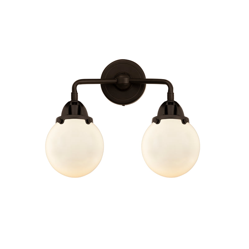 Beacon Bath Vanity Light shown in the Oil Rubbed Bronze finish with a Matte White shade