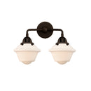 Oxford Bath Vanity Light shown in the Oil Rubbed Bronze finish with a Matte White shade