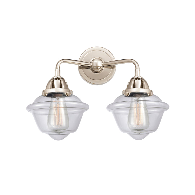 Oxford Bath Vanity Light shown in the Polished Nickel finish with a Clear shade