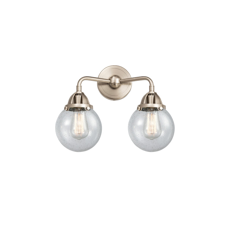 Beacon Bath Vanity Light shown in the Brushed Satin Nickel finish with a Seedy shade