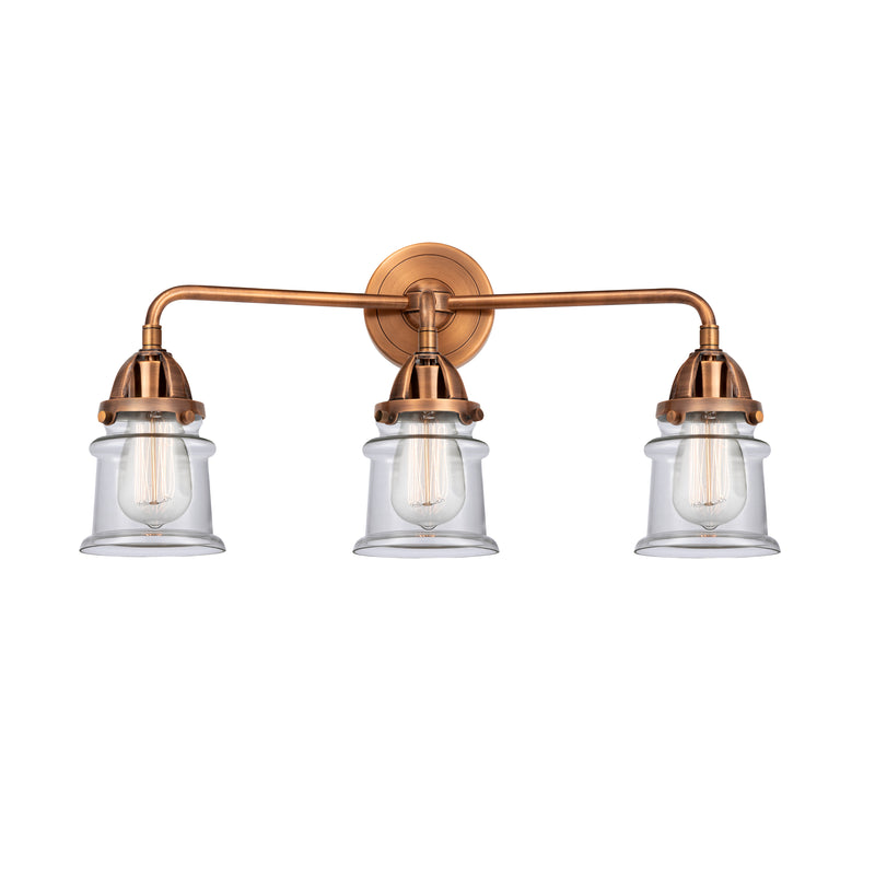 Canton Bath Vanity Light shown in the Antique Copper finish with a Clear shade