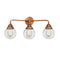 Beacon Bath Vanity Light shown in the Antique Copper finish with a Clear shade