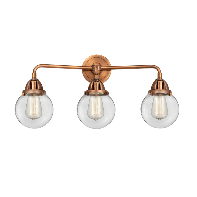 Beacon Bath Vanity Light shown in the Antique Copper finish with a Clear shade