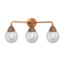 Beacon Bath Vanity Light shown in the Antique Copper finish with a Seedy shade