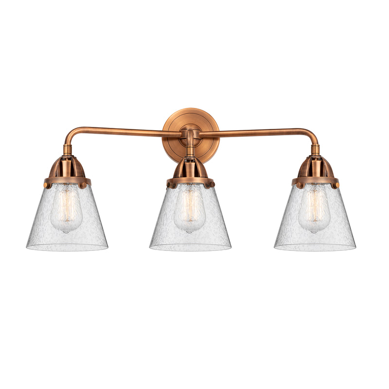 Cone Bath Vanity Light shown in the Antique Copper finish with a Seedy shade