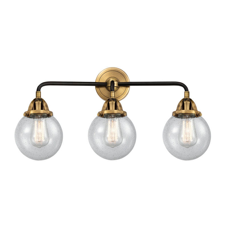 Beacon Bath Vanity Light shown in the Black Antique Brass finish with a Seedy shade