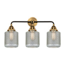 Stanton Bath Vanity Light shown in the Black Antique Brass finish with a Clear Wire Mesh shade