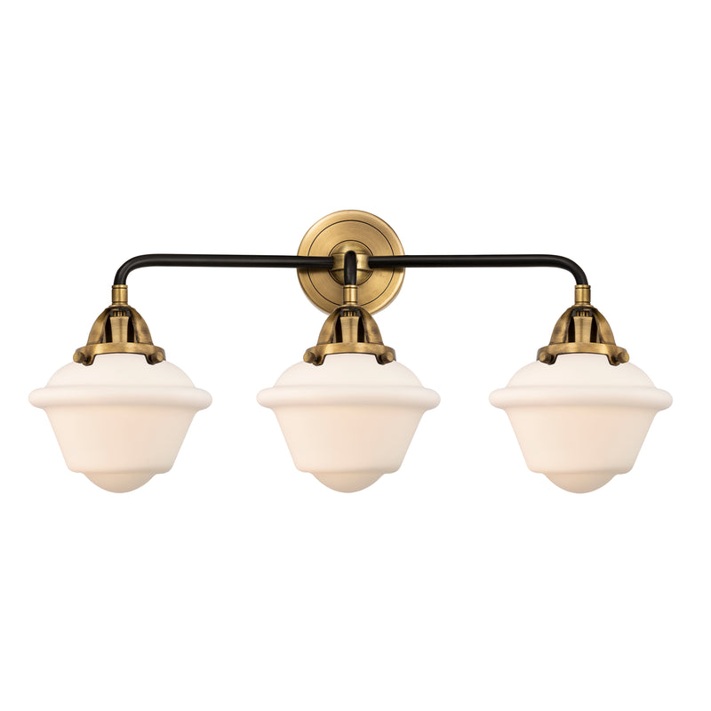 Oxford Bath Vanity Light shown in the Black Antique Brass finish with a Matte White shade