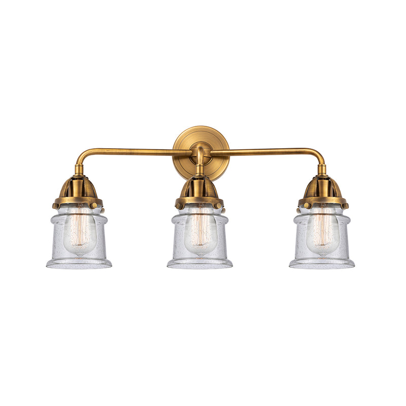 Canton Bath Vanity Light shown in the Brushed Brass finish with a Seedy shade