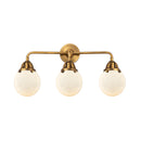 Beacon Bath Vanity Light shown in the Brushed Brass finish with a Matte White shade