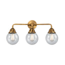 Beacon Bath Vanity Light shown in the Brushed Brass finish with a Seedy shade