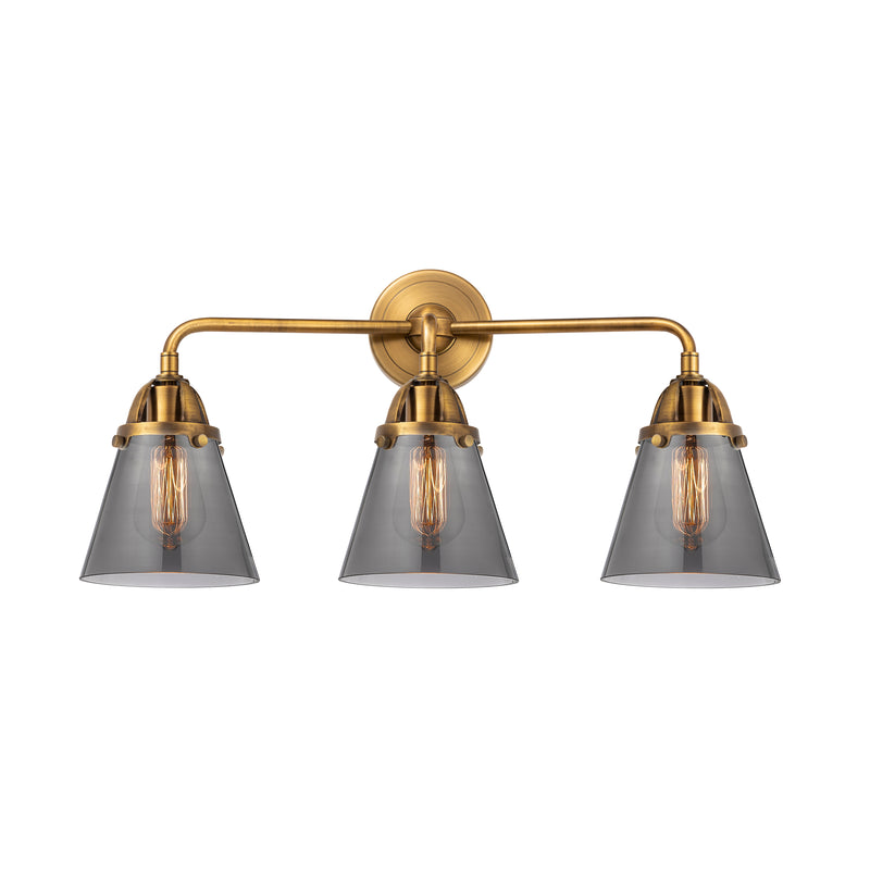 Cone Bath Vanity Light shown in the Brushed Brass finish with a Plated Smoke shade