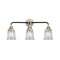 Canton Bath Vanity Light shown in the Black Polished Nickel finish with a Clear shade