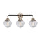 Oxford Bath Vanity Light shown in the Black Polished Nickel finish with a Clear shade