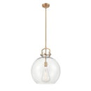 Newton Sphere Pendant shown in the Brushed Brass finish with a Clear shade