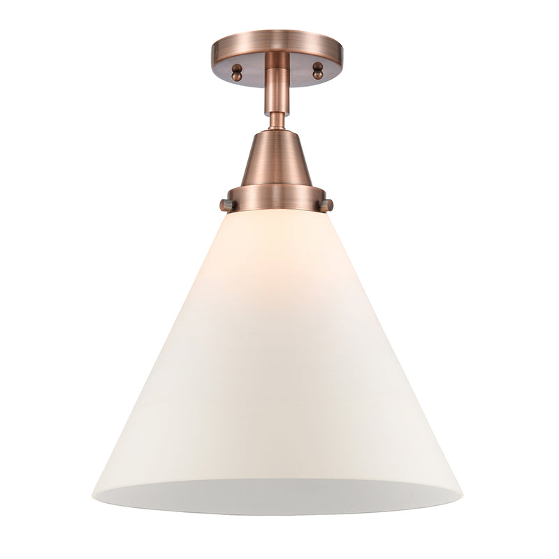 Cone Flush Mount shown in the Antique Copper finish with a Matte White shade