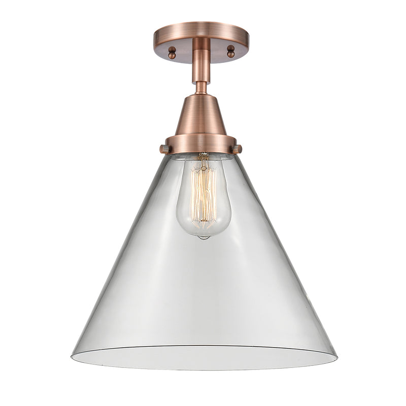 Cone Flush Mount shown in the Antique Copper finish with a Clear shade