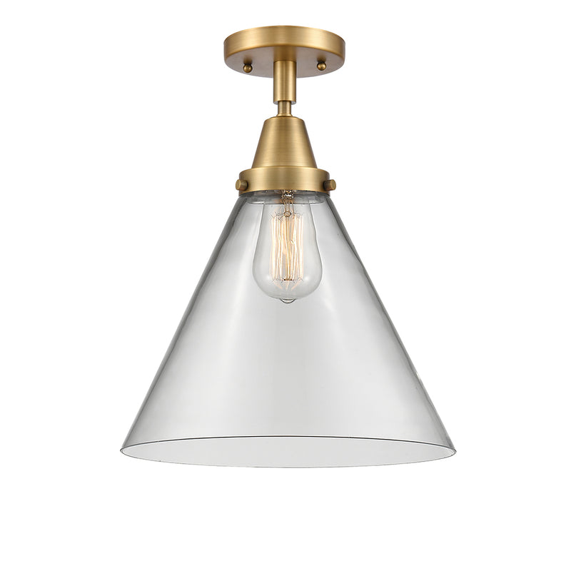 Cone Flush Mount shown in the Brushed Brass finish with a Clear shade