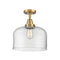 Bell Flush Mount shown in the Brushed Brass finish with a Clear shade