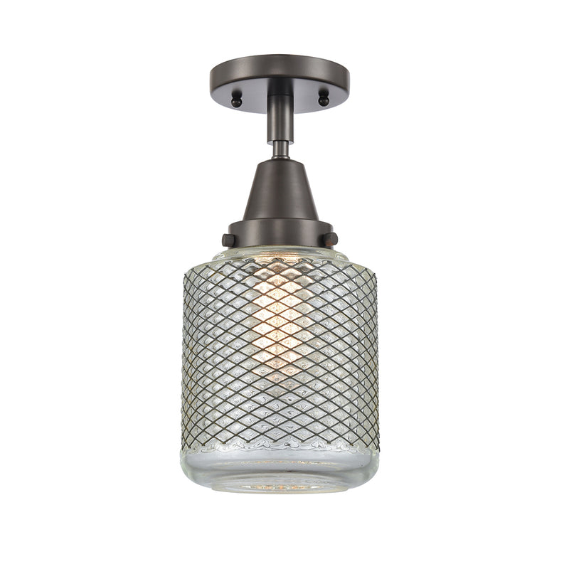 Stanton Flush Mount shown in the Oil Rubbed Bronze finish with a Clear Wire Mesh shade