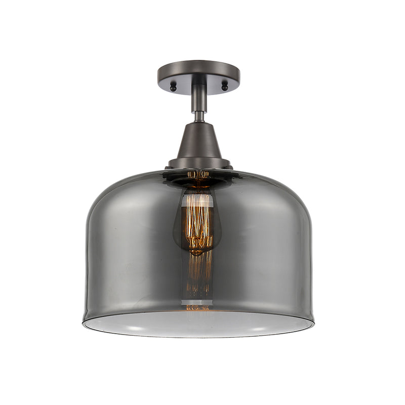 Bell Flush Mount shown in the Oil Rubbed Bronze finish with a Plated Smoke shade