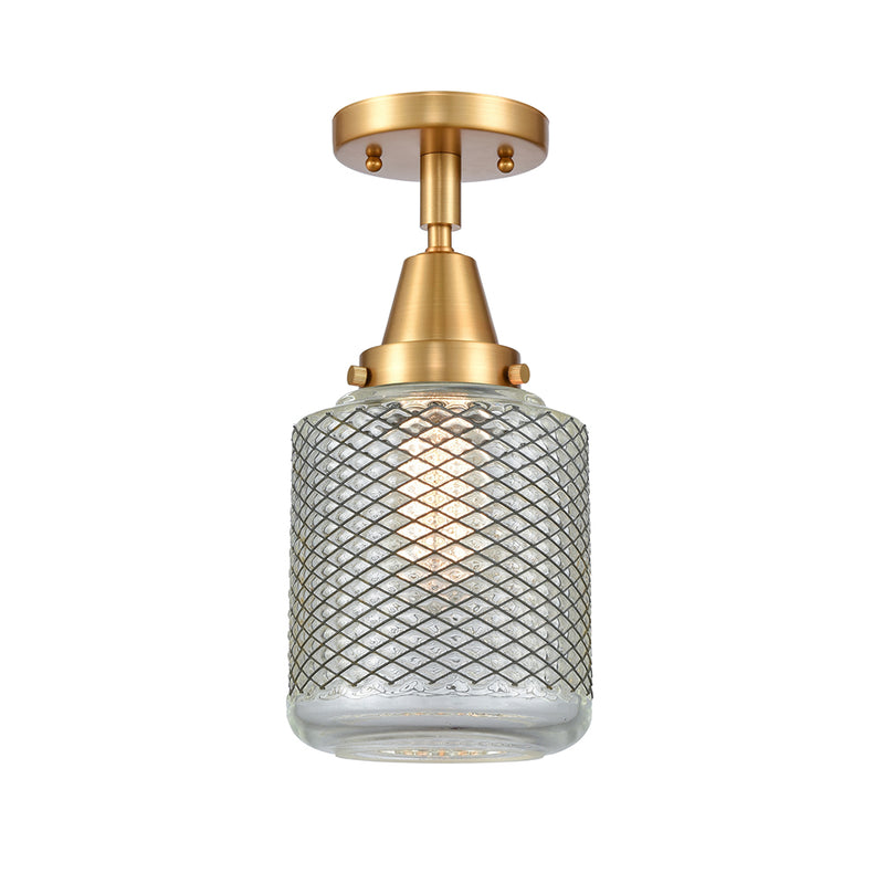 Stanton Flush Mount shown in the Satin Gold finish with a Clear Wire Mesh shade