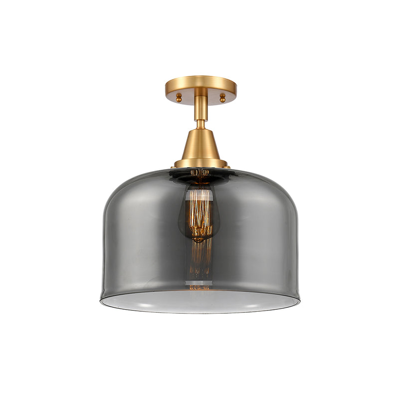 Bell Flush Mount shown in the Satin Gold finish with a Plated Smoke shade