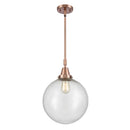 Beacon Mini Pendant shown in the Antique Copper finish with a Seedy shade