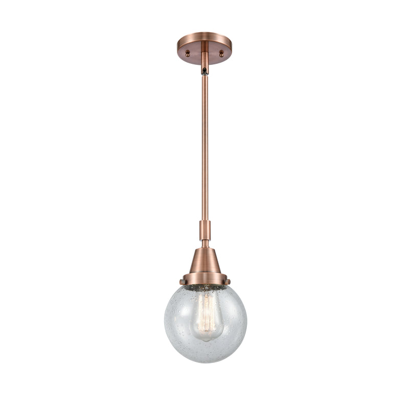 Beacon Mini Pendant shown in the Antique Copper finish with a Seedy shade