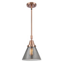 Cone Mini Pendant shown in the Antique Copper finish with a Plated Smoke shade