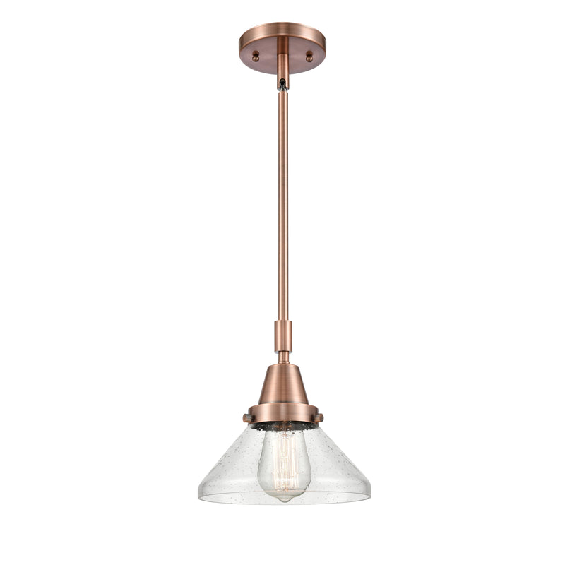 Caden Mini Pendant shown in the Antique Copper finish with a Seedy shade