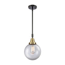 Beacon Mini Pendant shown in the Black Antique Brass finish with a Clear shade