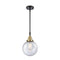 Beacon Mini Pendant shown in the Black Antique Brass finish with a Seedy shade