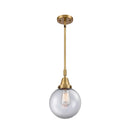 Beacon Mini Pendant shown in the Brushed Brass finish with a Clear shade