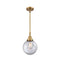 Beacon Mini Pendant shown in the Brushed Brass finish with a Clear shade