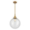 Beacon Mini Pendant shown in the Brushed Brass finish with a Seedy shade