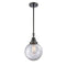 Beacon Mini Pendant shown in the Matte Black finish with a Clear shade