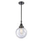 Beacon Mini Pendant shown in the Matte Black finish with a Seedy shade