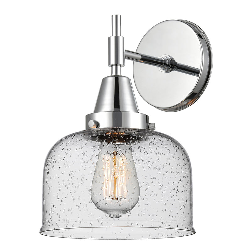 Caden Sconce shown in the Polished Chrome finish with a Seedy shade