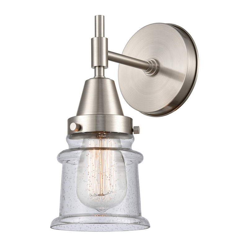 Caden Sconce shown in the Satin Nickel finish with a Seedy shade