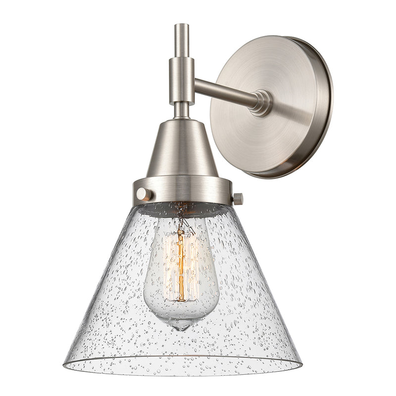 Caden Sconce shown in the Satin Nickel finish with a Seedy shade