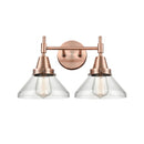 Caden Bath Vanity Light shown in the Antique Copper finish with a Clear shade