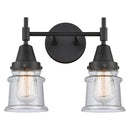 Caden Bath Vanity Light shown in the Matte Black finish with a Seedy shade