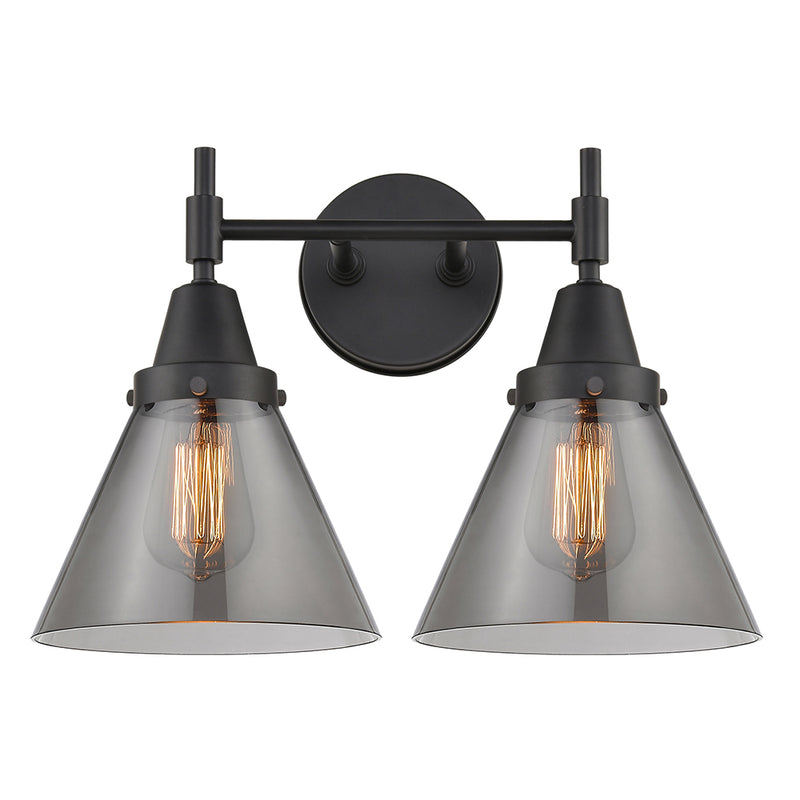 Caden Bath Vanity Light shown in the Matte Black finish with a Plated Smoke shade