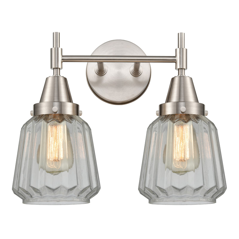 Caden Bath Vanity Light shown in the Satin Nickel finish with a Clear shade