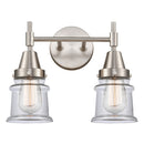 Caden Bath Vanity Light shown in the Satin Nickel finish with a Clear shade