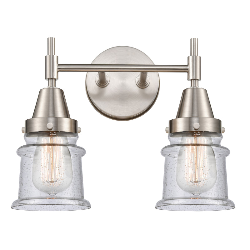 Caden Bath Vanity Light shown in the Satin Nickel finish with a Seedy shade