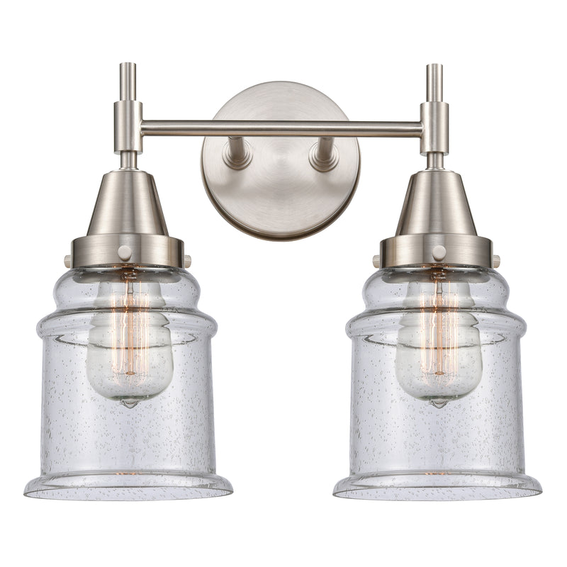 Caden Bath Vanity Light shown in the Satin Nickel finish with a Seedy shade