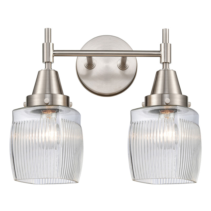 Caden Bath Vanity Light shown in the Satin Nickel finish with a Clear Halophane shade