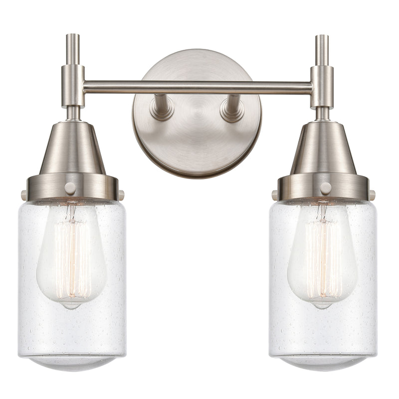 Caden Bath Vanity Light shown in the Satin Nickel finish with a Seedy shade